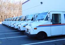 Postal vans, all in a row