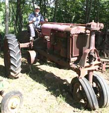 Man on Farmall F-20