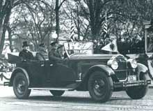 Coolidge and friend in Packard