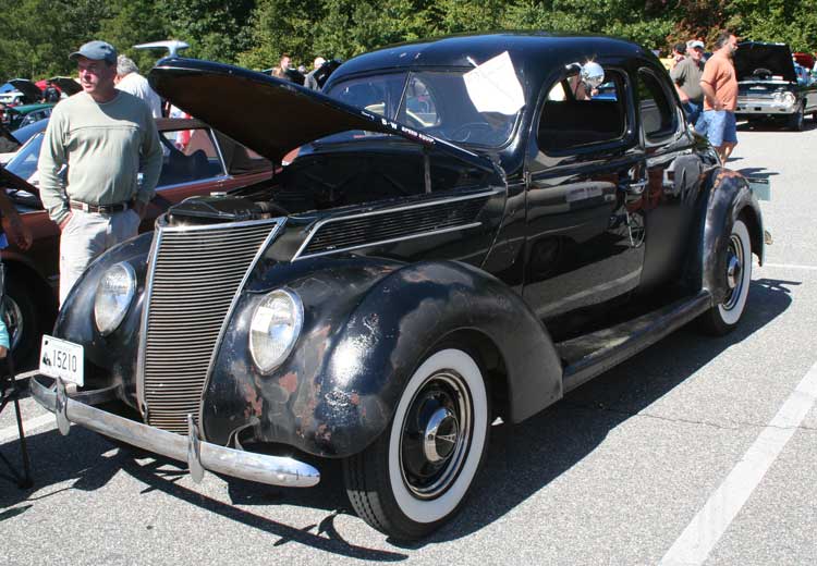 A 1937 Ford coupe looked 